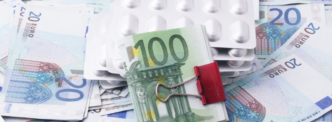Billetes de euro y pastillas
