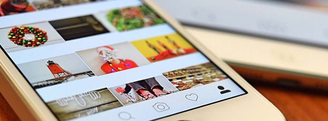 Pantalla de móvil con diferentes fotos de un perfil social